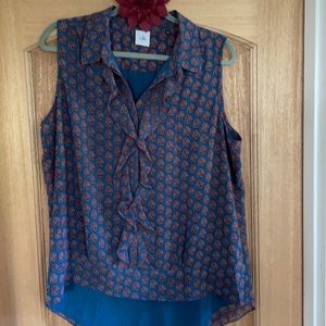 Pattern sleeveless blouse in navy with ruffles